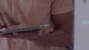 Man tapping tablet screen and dragging graph visualizing financial data then sending green spike. Analytics, data visualization, futurism, digital interface, professional, business, innovation - Powered by Shutterstock - Get 15% off with code: PIKWIZARD15