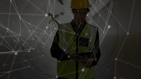 Construction engineer tapping tablet wearing helmet starting network overlay for mapping pipe. Industrial, technology, innovation, engineering, digital, inspection, futuristic - Powered by Shutterstock - Get 15% off with code: PIKWIZARD15