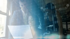 Colleagues analyzing doc as holographic galaxy display emerging in front for technology research. Collaboration, innovation, digital, futuristic, business, teamwork, data visualization - Powered by Shutterstock - Get 15% off with code: PIKWIZARD15