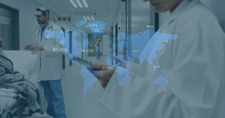 Mature male doctor walking hospital corridor explaining data with digital world map overlay. Medical, healthcare, professionals, clinical, information, digital, diagnostic