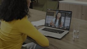 Coworkers gesturing during tech call as rotating padlock icon and binary streams encircling both. Collaboration, communication, technology, datasecurity, professionalism, modernoffice, - Powered by Shutterstock - Get 15% off with code: PIKWIZARD15