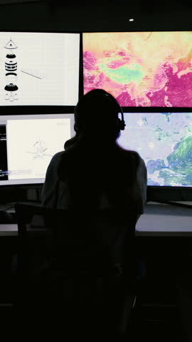 Computer screen, reading and back of woman in control room for climate data analyst, pressure or monitor. Meteorologist, rocket sensor and mission report with person for weather forecast and research