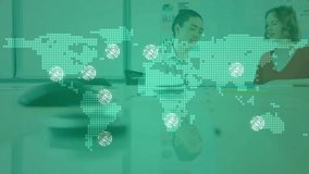 Business colleagues spawning translucent overlay with glowing nodes connecting map collaborating. Collaboration, global, network, innovation, communication, technology, partnership - Powered by Shutterstock - Get 15% off with code: PIKWIZARD15