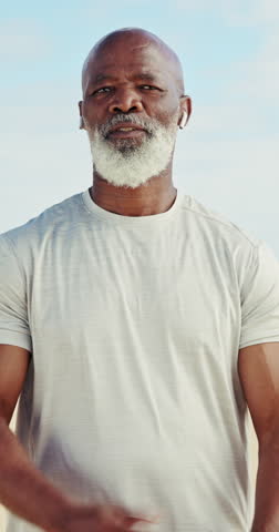 Face, earphones and black man outdoor for fitness, wellness or audio for active retirement. Portrait, exercise music and confident senior person, arms crossed or happy runner listen to health podcast