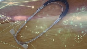 Doctor hand entering frame writing patient notes in notebook by stethoscope amid network graphics. Medical, healthcare, clinical, technology, innovation, professional, diagnostics - Powered by Shutterstock - Get 15% off with code: PIKWIZARD15