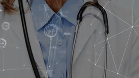 Camera moving up revealing doctor smiling with stethoscope, network overlays displaying connections. Medical, healthcare, digital, technology, professional, innovation, wellness - Powered by Shutterstock - Get 15% off with code: PIKWIZARD15