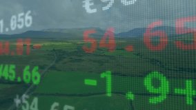 At start financial ticker flashing red and green values over fields, showing market trends. Investment, rural, landscape, data visualization, analytics, technology, economy - Powered by Shutterstock - Get 15% off with code: PIKWIZARD15