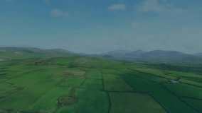 On play, line chart sliding over aerial farmland segments pulsing and rising, showing data growth. Agriculture, data visualization, rural, landscape, growth, analytics, sustainability - Powered by Shutterstock - Get 15% off with code: PIKWIZARD15