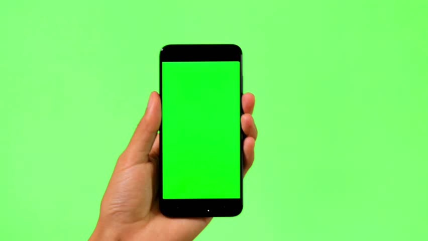 A hand holding a smartphone with a green screen, performing tap, scroll, and swipe gestures. Chroma key mockup isolated on a green background for easy compositing.