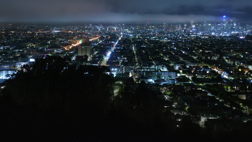 San Francisco Night Skyline Panorama from Bernal Heights Time Lapse Tilt Up California USA