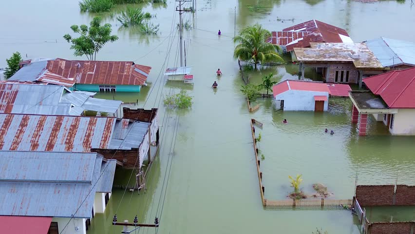 Flooded Street with People After Natural Disaster