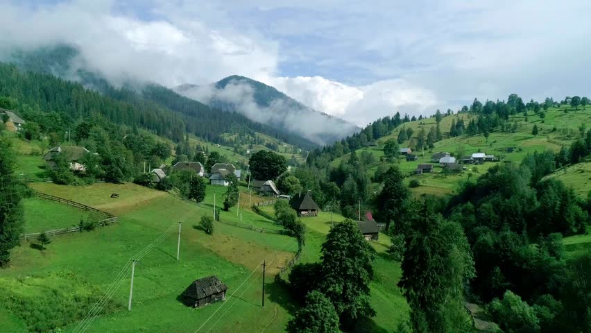 Beautifully landscape to mountain clouds and green woods around, majestic mountain landscape with dramatic clouds and surrounding green woods. breathtaking scenic view creating serene natural