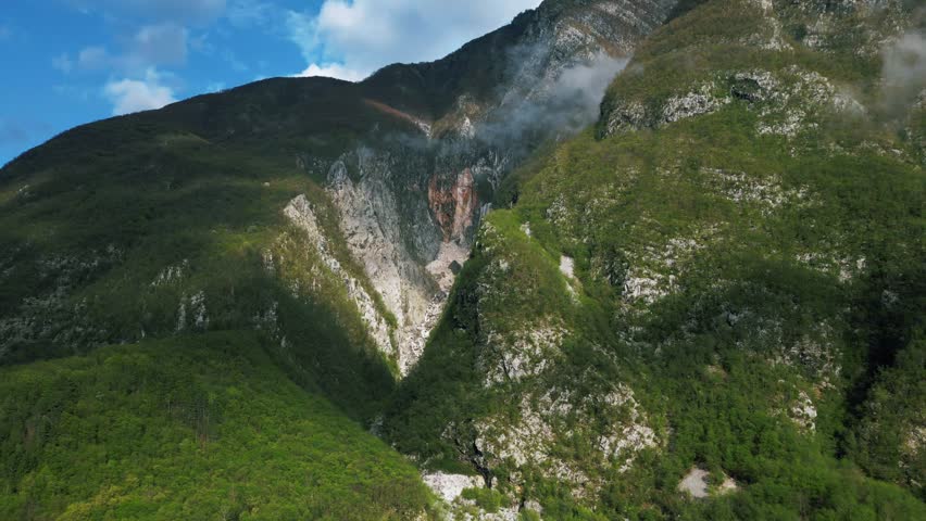 Boka waterfall, stunning scenic view of a tall waterfall on the side of mountain