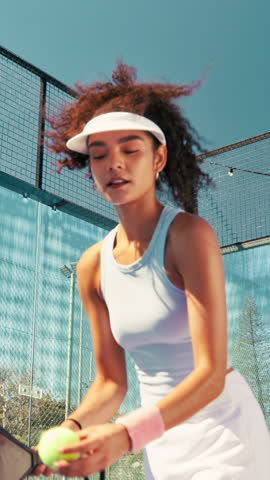 Woman, hit ball and padel with fitness on court for sports game, physical activity and exercise challenge. Agile, person and athlete with tennis serve for competition training, practice and workout.