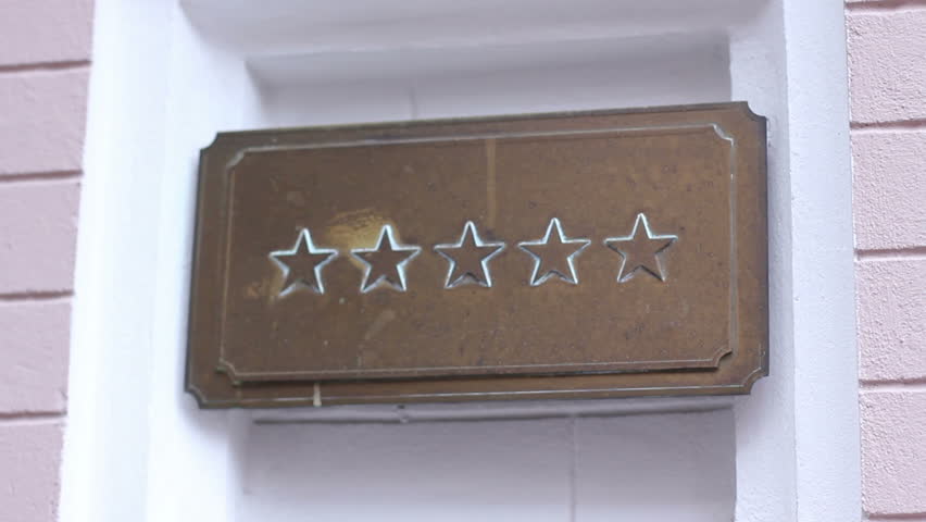 Five star sign on rich elite establishment like hotel, restaurant or shop