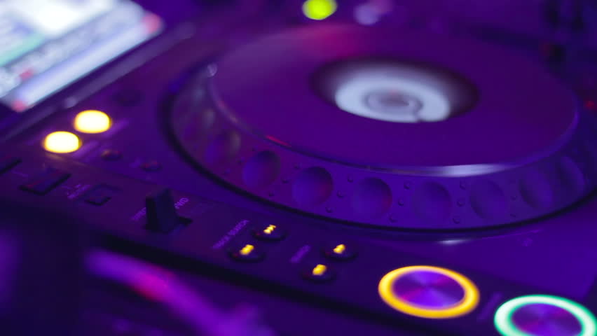DJ CD turntable blinks until female hand turns it off