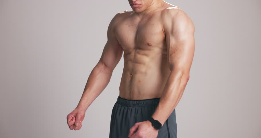 Hands, bodybuilder and flex muscle in studio, results or abs with mock up space on white background. Person, shirtless and fitness with transformation, healthy body and check progress with growth