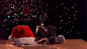 After stillness lights twinkling flakes drifting onto holiday objects as Season's Greetings fading. Festive, cozy, holiday, warmth, celebration, rustic, ambient - Powered by Shutterstock - Get 15% off with code: PIKWIZARD15