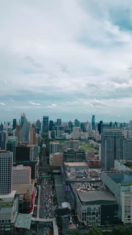 modern Bangkok city with skyscrapers of financial downtown district aerial view, drone view of bustling capital of Thailand 4k