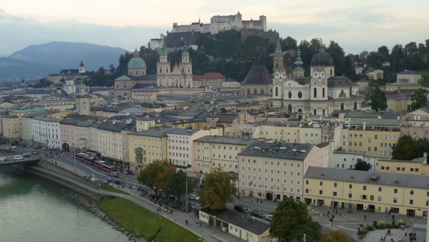 Explore stunning Salzburg with historic skyline and majestic mountains in 4K