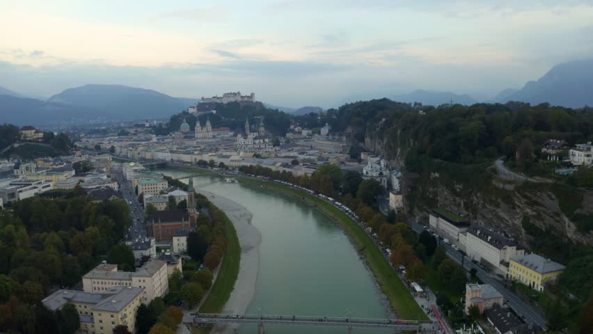 Discover Salzburgs stunning mountains and historic skyline in 4K