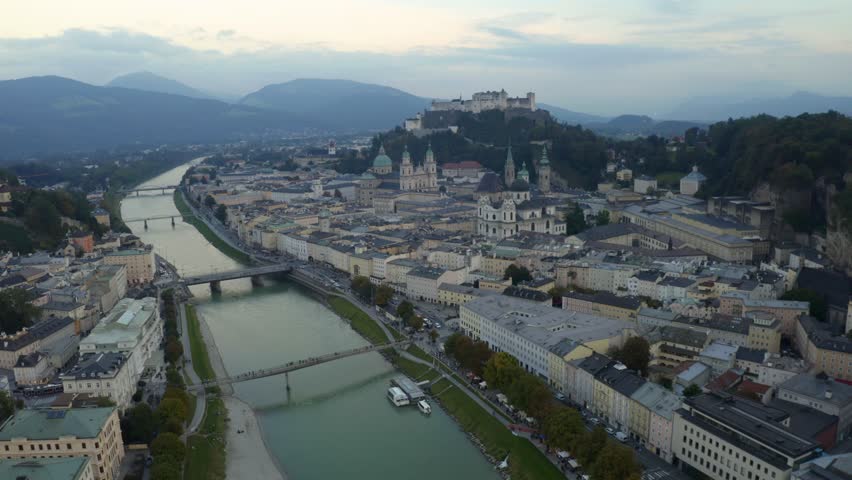 Discover Salzburgs stunning aerial view of its historic skyline and mountains