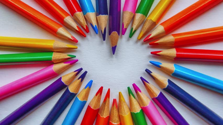 Creative life quote "Don't just see the world, color it" with vibrant colored pencils. Perfect for art, inspiration, and motivational projects.