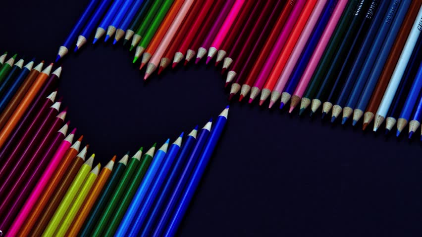 Inspiring quote "A pencil holds the power to color dreams into reality" with artistic pencils. Perfect for creativity, education, and motivation themes.