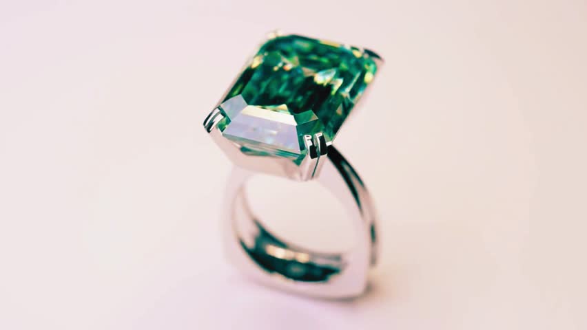 Luxurious jewelry ring featuring a stunning emerald gemstone surrounded by diamonds. Perfect for high-end fashion, engagement, bridal, and luxury jewelry visuals. - Powered by Shutterstock - Get 15% off with code: PIKWIZARD15
