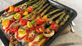 Roasted Asparagus with Cherry Tomatoes, Red Pepper, Mushrooms and Mozzarella on a Sheet Pan, Vegetarian Heathy Diet - Powered by Shutterstock - Get 15% off with code: PIKWIZARD15