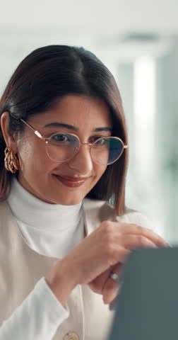 Happy woman, fist pump and celebration at office with goals, success and achievement at media company. Person, writer and smile with promotion, excited and bonus announcement at creative agency