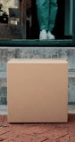 Home, front door and woman with box, delivery and product with logistics, ecommerce and parcel. Apartment, cardboard or person with package, consumer or courier service with shipping order or receive - Powered by Shutterstock - Get 15% off with code: PIKWIZARD15