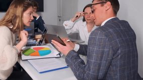 team reviews metrics, team reviews tablet data and metrics, team discusses campaign success metrics and data analysis, team collaborates on analyzing pie charts and colorcoded campaign performance - Powered by Shutterstock - Get 15% off with code: PIKWIZARD15