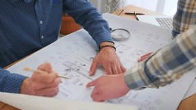 manager measures meticulously, project manager uses ruler carefully, manager and colleague analyzing plans with tools, focused manager verifies measurements with colleagues in studio setting - Powered by Shutterstock - Get 15% off with code: PIKWIZARD15