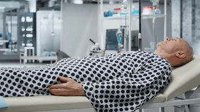 Doctors in hazmat suit doing examination on a patient with viral symptoms, analyzing medical data and testing vaccines to ensure health safety and improve global pandemic response. Camera B. - Powered by Shutterstock - Get 15% off with code: PIKWIZARD15