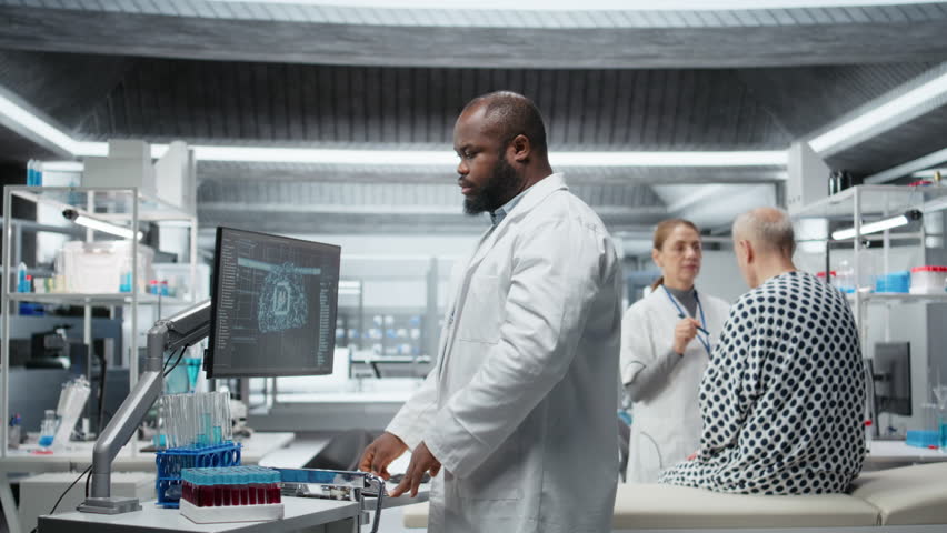 Black medic using artificial intelligence to observe effect during new drug test, collecting pharmacology data with neural networks system. Biomedicine discovery and innovation. Camera A.