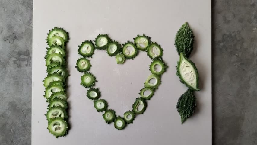 Fun with Vegetables: Bitter Gourd Slices Form Heartfelt Message
