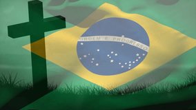 Gentle breeze stirring grass and waving Brazilian flag while cross silhouette honoring emblem. Patriotism, nationalism, motion, fabric, symbolism, outdoors, scenic - Powered by Shutterstock - Get 15% off with code: PIKWIZARD15
