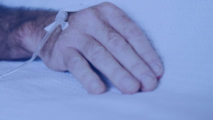 closeup showing patient hand with IV catheter causing digital charts emerging for monitoring vitals. Medical, healthcare, digital, analysis, technology, monitoring, clinical - Powered by Shutterstock - Get 15% off with code: PIKWIZARD15