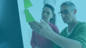 Two colleagues discussing business activating overlay shifting charts to world map for analysis. Collaborative, analytics, digital, professional, modern, strategic, data - Powered by Shutterstock - Get 15% off with code: PIKWIZARD15