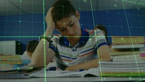 Teenage boy writing in classroom while green grid overlay scanning notebook for data analysis. Student, education, technology, learning, study, knowledge, academic - Powered by Shutterstock - Get 15% off with code: PIKWIZARD15