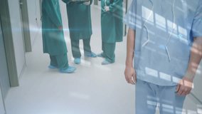 Surgeons consulting clipboard and activating medical hologram upon camera focusing smiling surgeon. Medical, teamwork, innovation, technology, collaboration, professionalism, futuristic - Powered by Shutterstock - Get 15% off with code: PIKWIZARD15