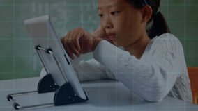 Girl leaning desk and watching tablet while initiating 5G overlay and exploring 6G pattern. Technology, innovation, connectivity, digital, futuristic, education, youth - Powered by Shutterstock - Get 15% off with code: PIKWIZARD15