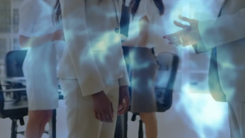 Mature woman grabbing smartphone as colleague extending phone for business data review with overlay. Collaboration, teamwork, digital, professional, innovation, modern, data - Powered by Shutterstock - Get 15% off with code: PIKWIZARD15