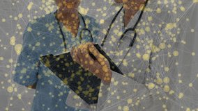 Physician scrolling tablet patient info and reviewing while nurse observing both smiling at camera. Collaboration, healthcare, professionalism, technology, digital, teamwork, clinical - Powered by Shutterstock - Get 15% off with code: PIKWIZARD15