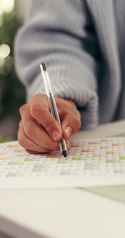 Hand, writing and calendar for planning agenda, timetable or remote work task. Pen, person and mark document for schedule, event priority or organize dates for freelance appointment reminder in home