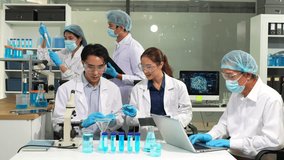 Scientists conducting research in a biotechnology lab, using pipettes and test tubes for medical and chemical experiments. Innovation in chemistry, healthcare, and medicine. - Powered by Shutterstock - Get 15% off with code: PIKWIZARD15