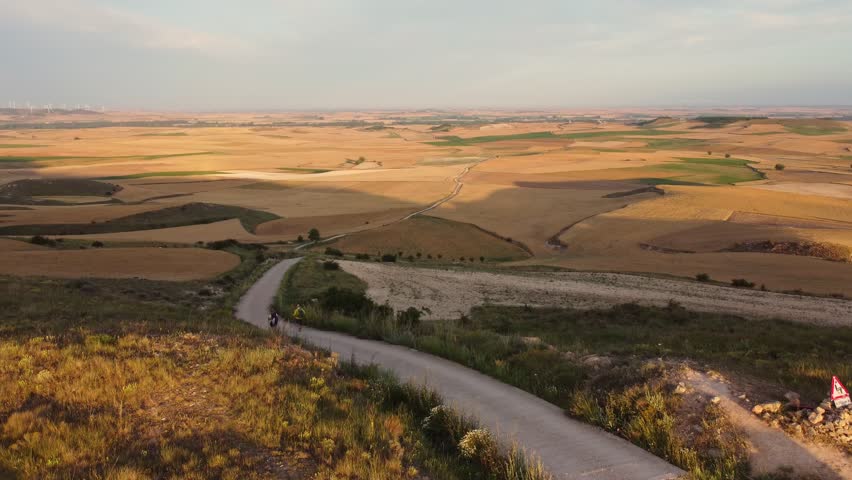 Aerial Sunrise View over Alto de Mostelares near Castrojeriz, Spain – Scenic Fields along the Camino de Santiago