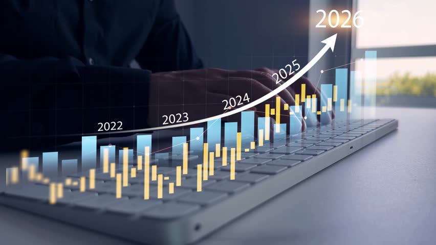 Businessman analyzing financial growth chart for 2026 year.Showing revenue increase, market trends, investment strategy, economic progress, success and future business development in 2026