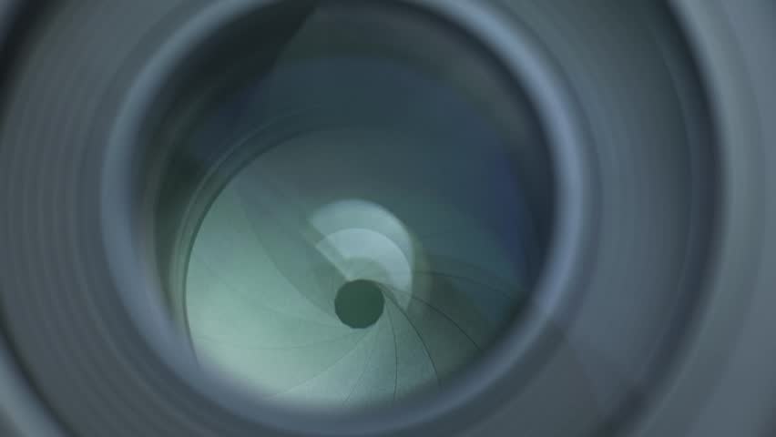 Controlling aperture and depth of field in camera lens